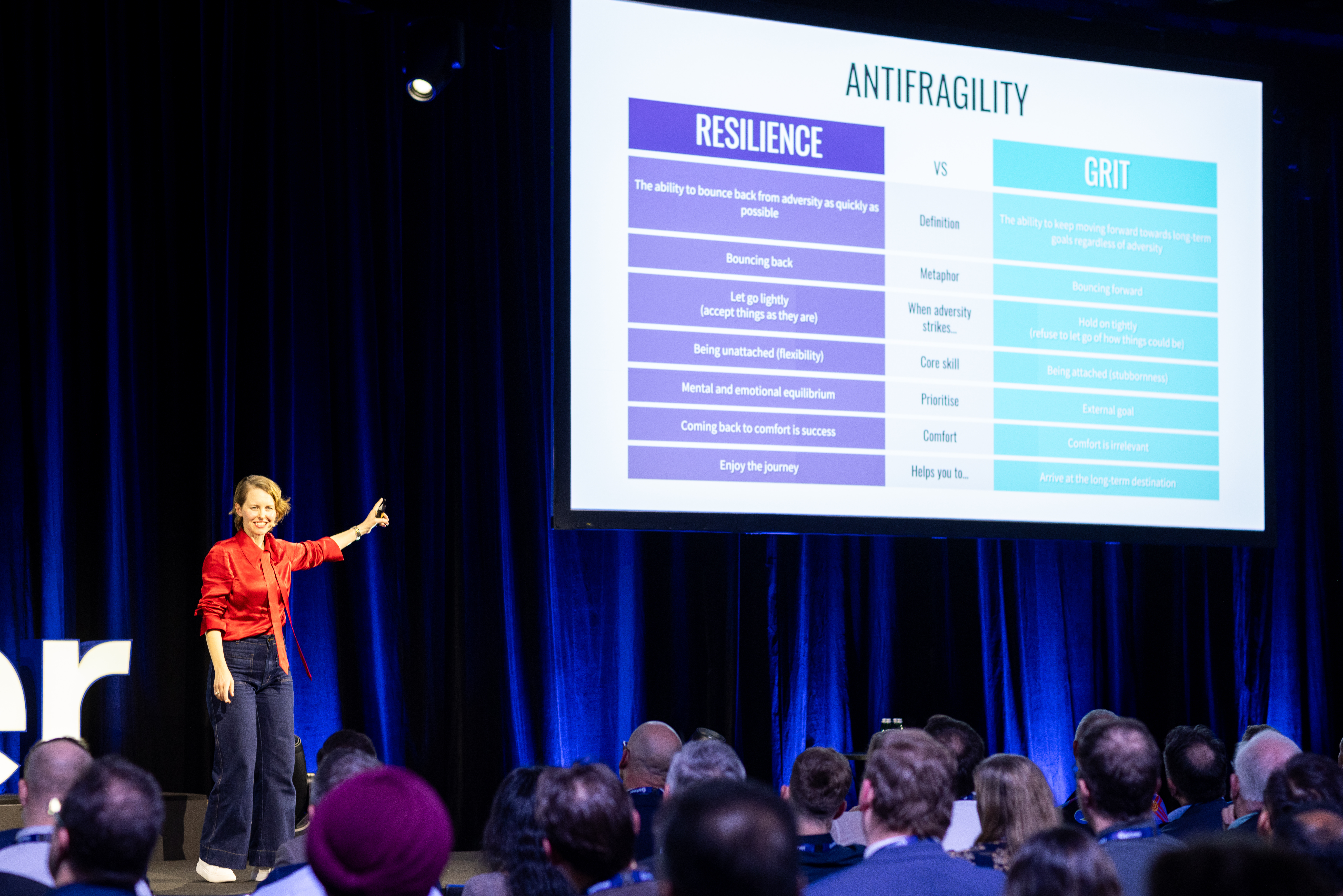 Michelle Rushton presenting on antifragility on stage